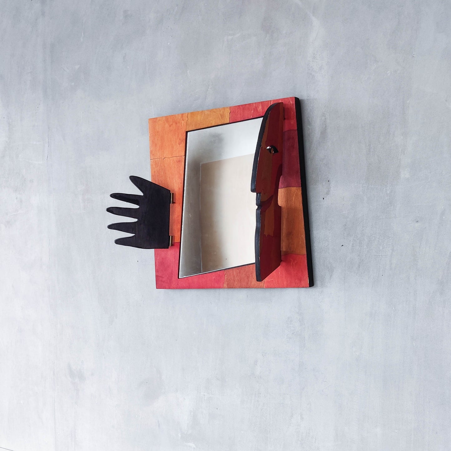 A vintage artist made modernist abstract puzzle mirror with hinged face and hand