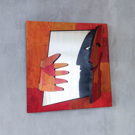 A vintage artist made modernist abstract puzzle mirror with hinged face and hand