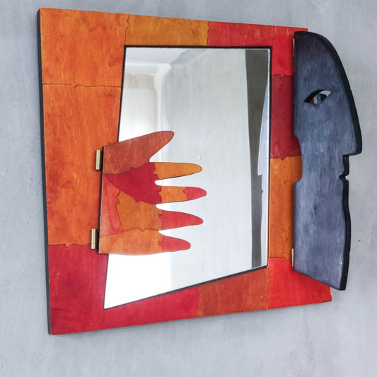 A vintage artist made modernist abstract puzzle mirror with hinged face and hand