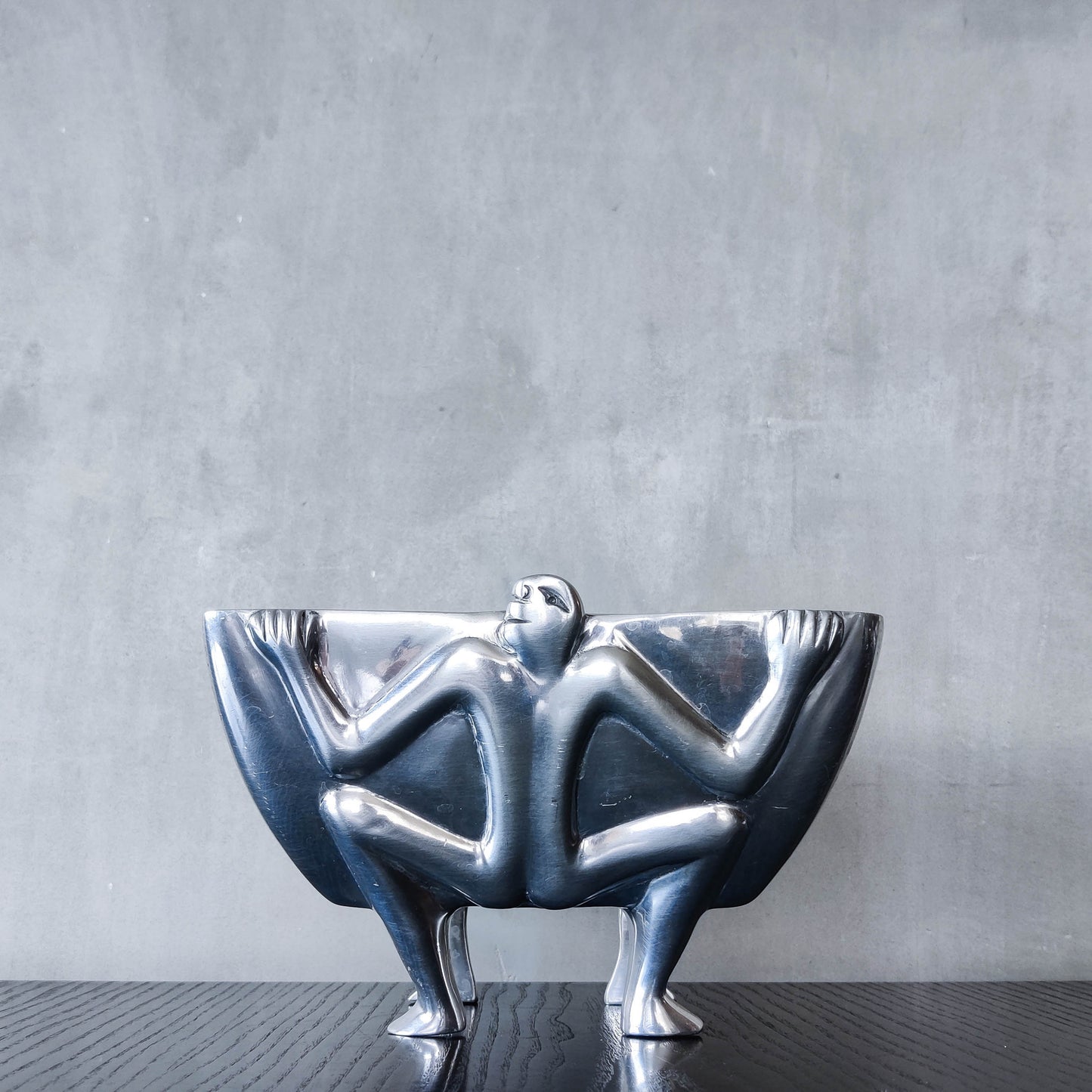 Carrol Boyes 1990s sculptural cast aluminium rectangular fruit bowl with figural feet