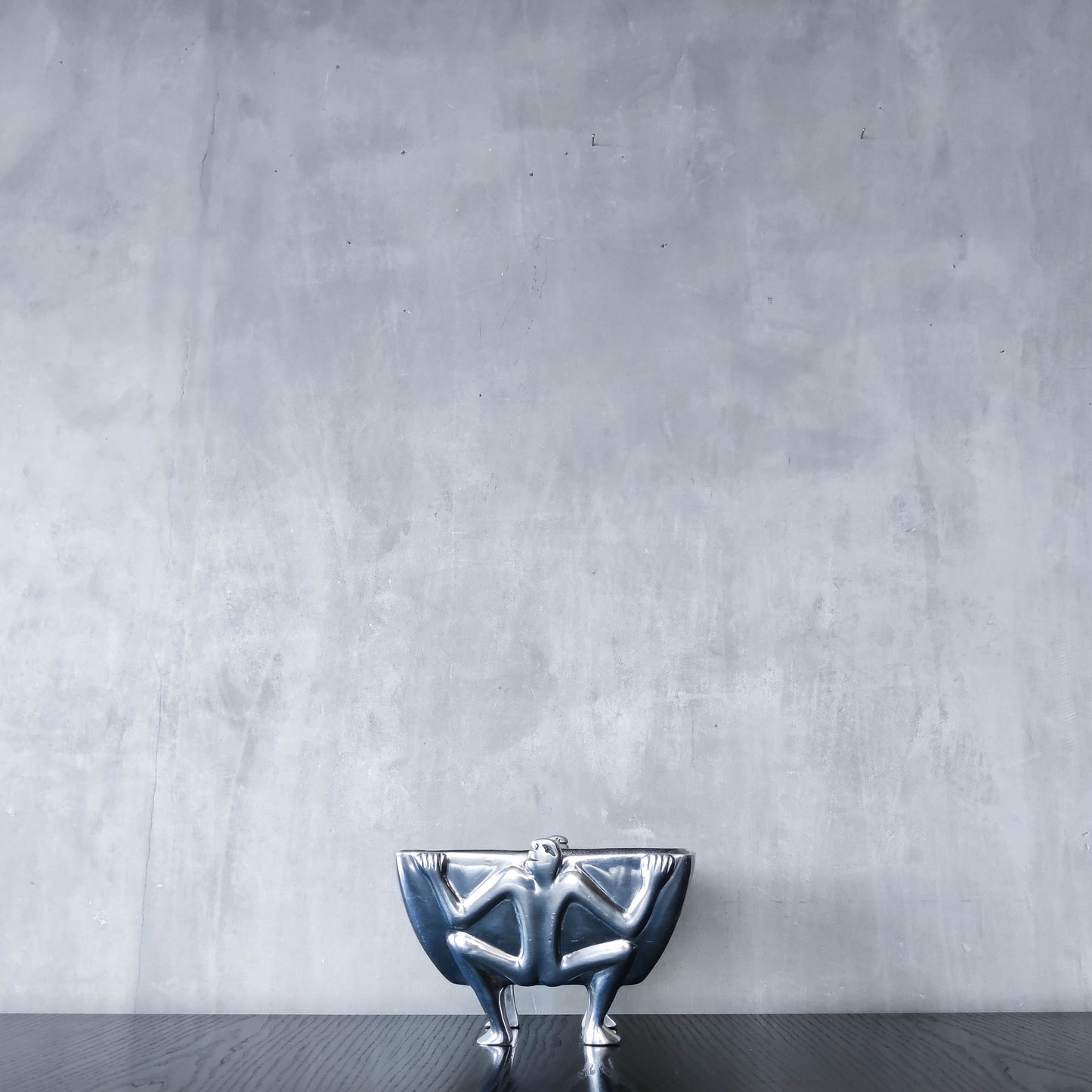 Carrol Boyes 1990s sculptural cast aluminium rectangular fruit bowl with figural feet