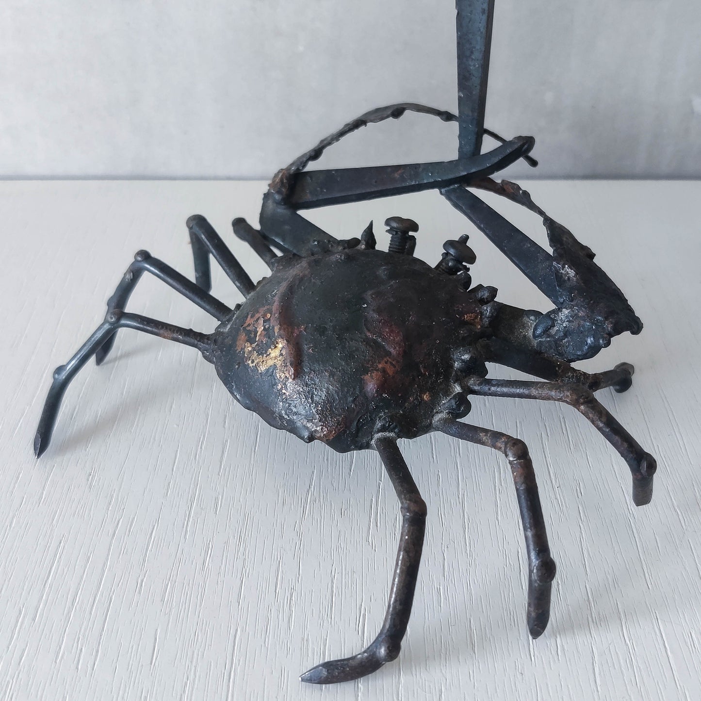 A vintage 1988 signed artisan made metalwork surreal candle holder with crab