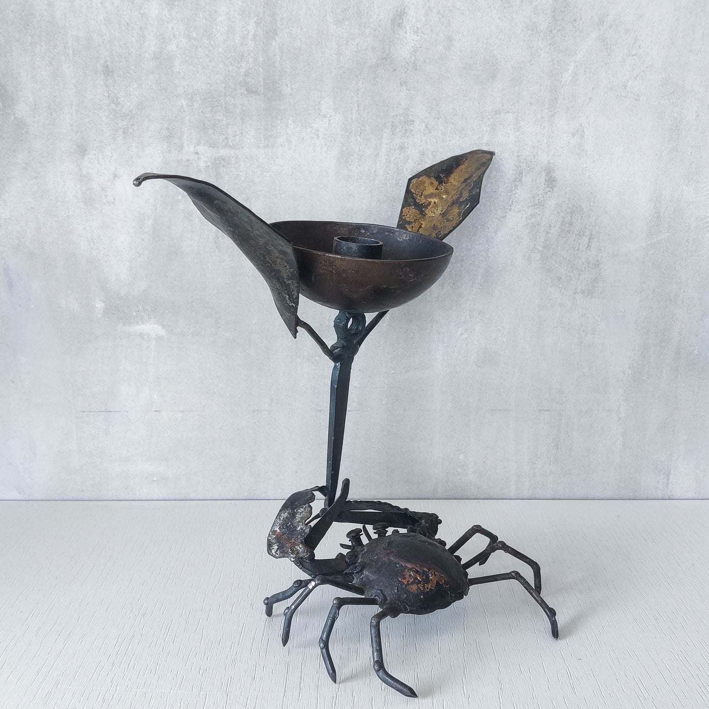 A vintage 1988 signed artisan made metalwork surreal candle holder with crab