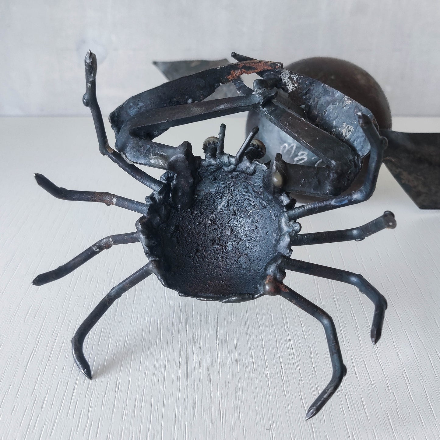 A vintage 1988 signed artisan made metalwork surreal candle holder with crab