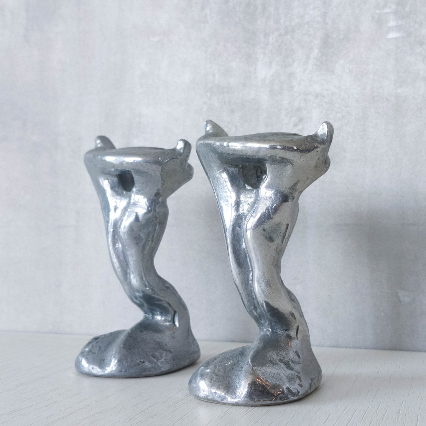 Pair of vintage 1980s ART3 David Marshall style cast aluminum brutalist candle holders