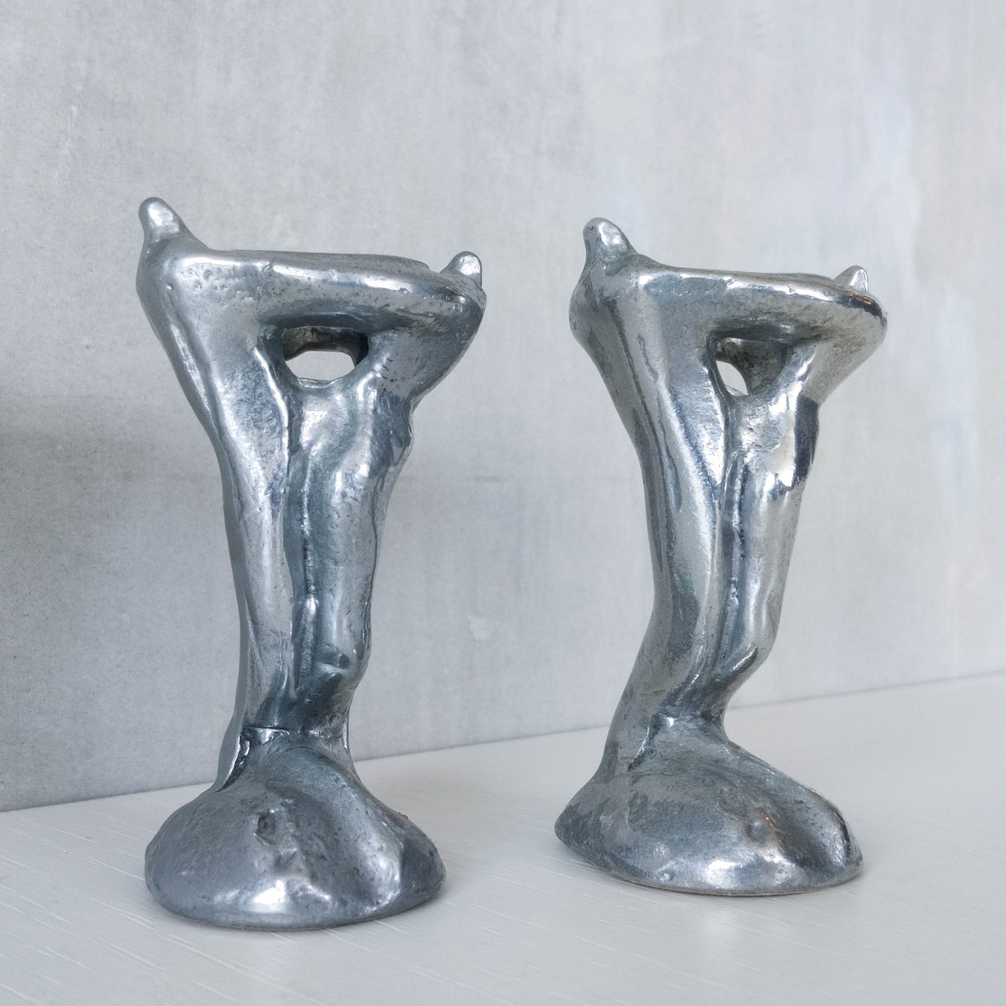 Pair of vintage 1980s ART3 David Marshall style cast aluminum brutalist candle holders
