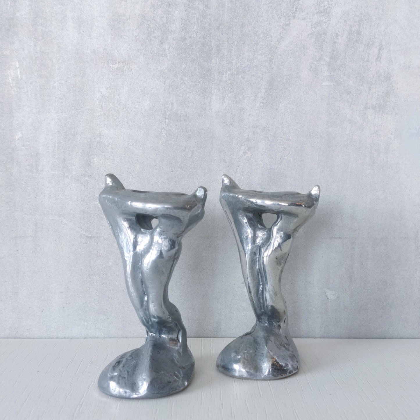 Pair of vintage 1980s ART3 David Marshall style cast aluminum brutalist candle holders