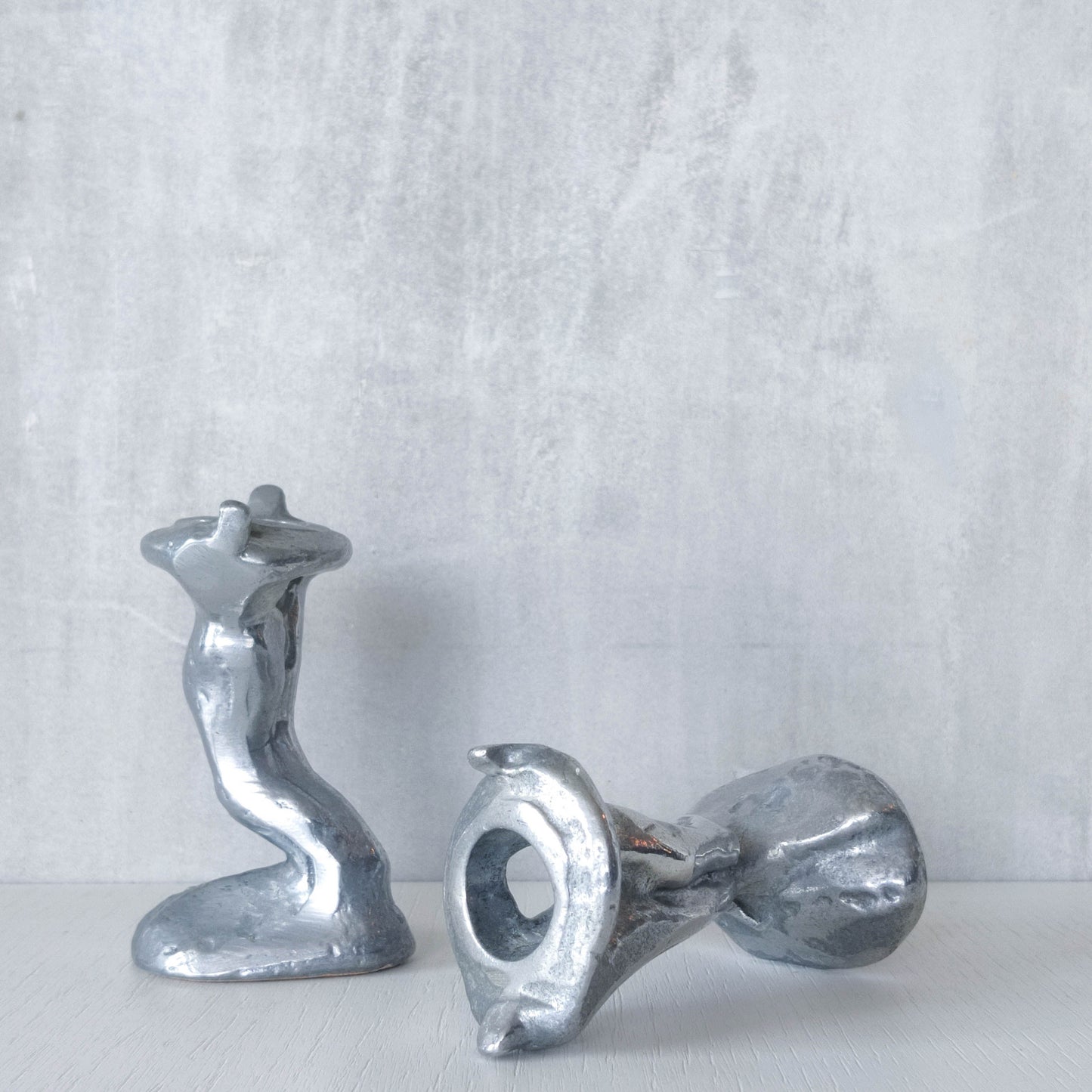 Pair of vintage 1980s ART3 David Marshall style cast aluminum brutalist candle holders