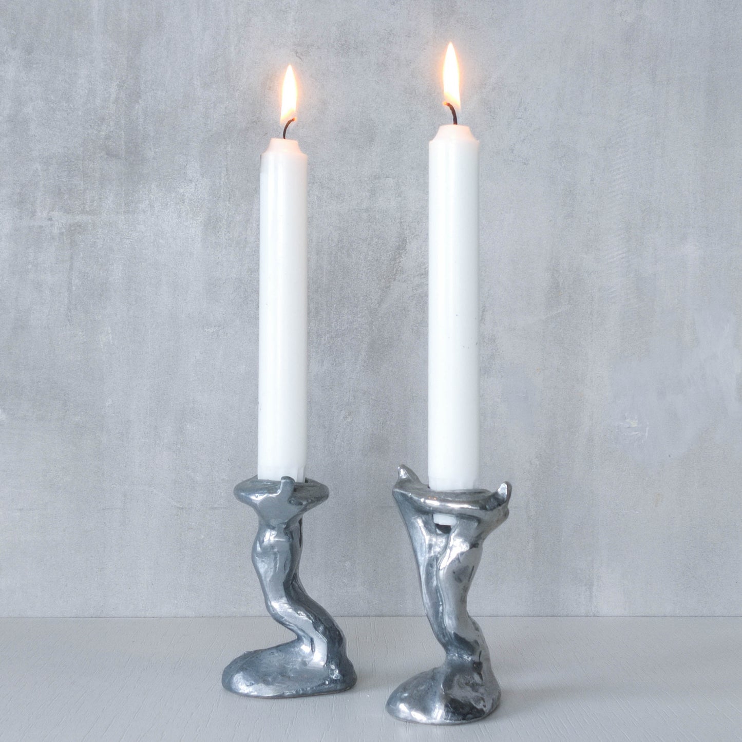 Pair of vintage 1980s ART3 David Marshall style cast aluminum brutalist candle holders