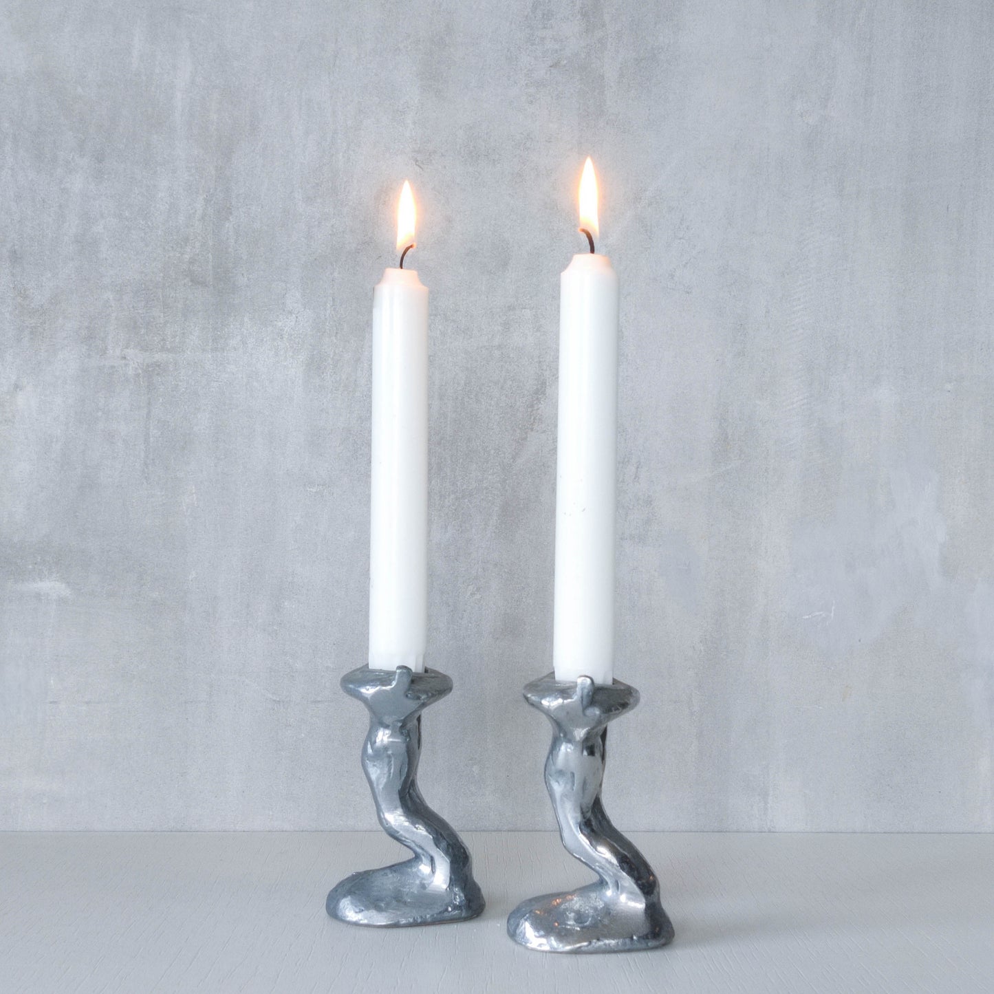 Pair of vintage 1980s ART3 David Marshall style cast aluminum brutalist candle holders