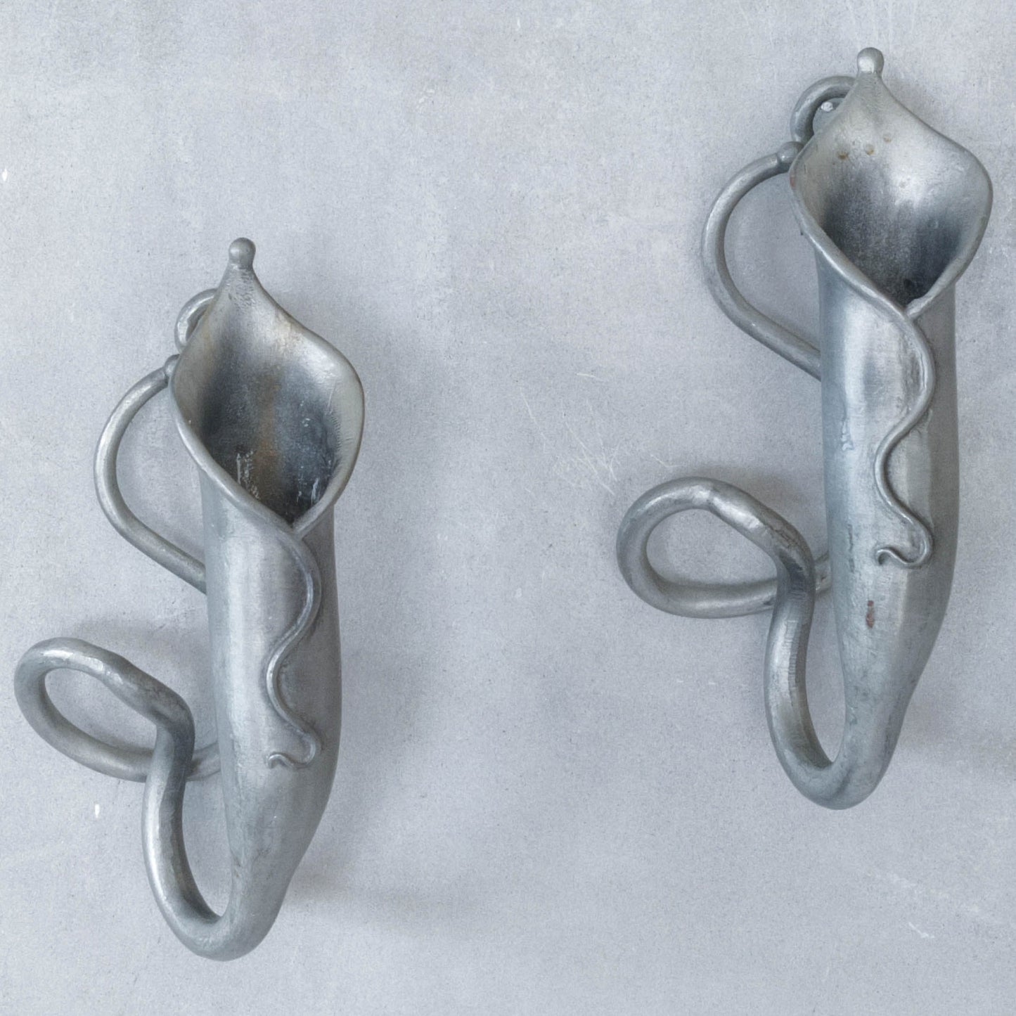 Pair of vintage handmade pewter candle holder wall sconces