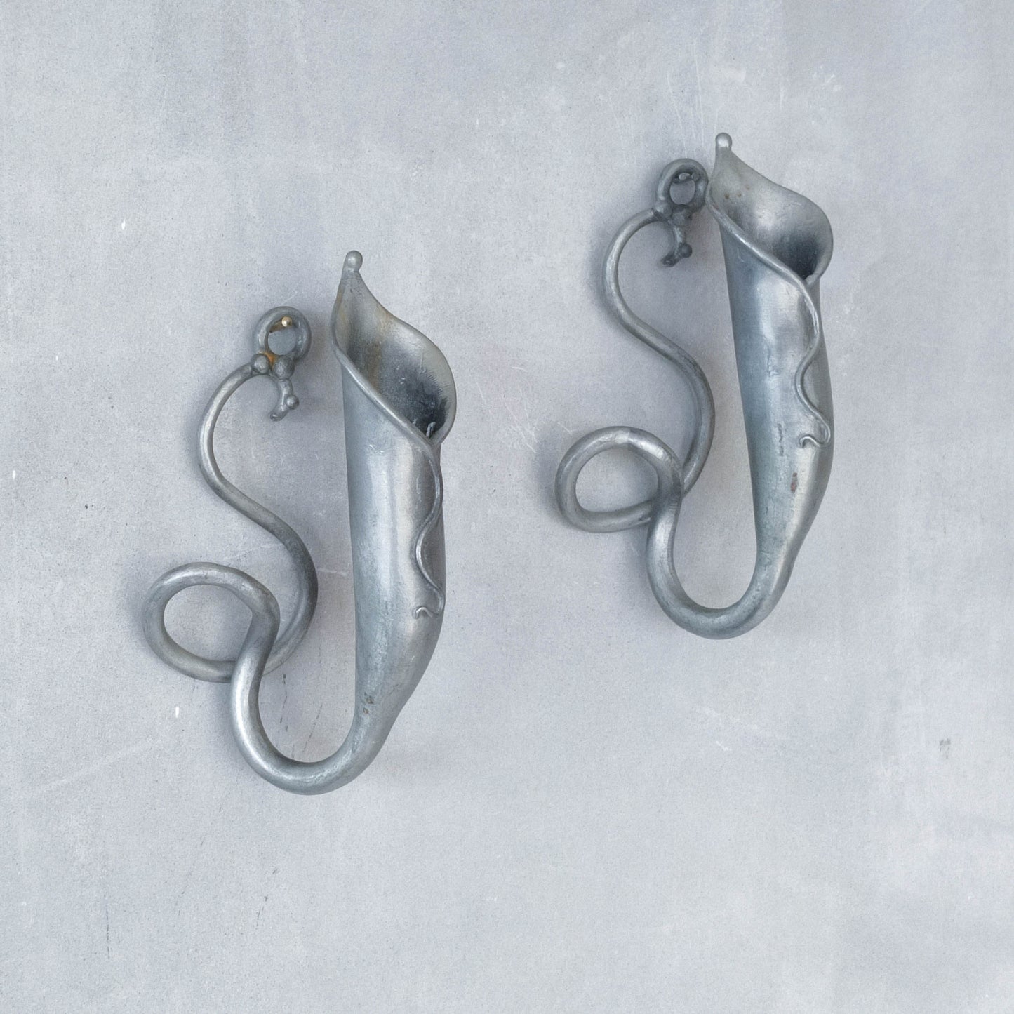 Pair of vintage handmade pewter candle holder wall sconces