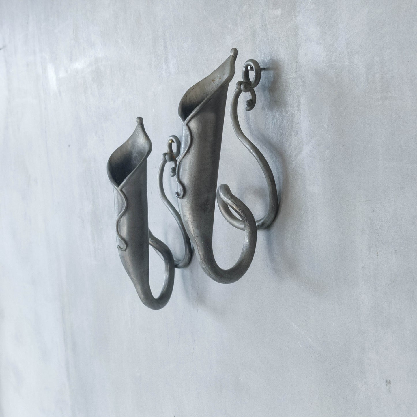 Pair of vintage handmade pewter candle holder wall sconces