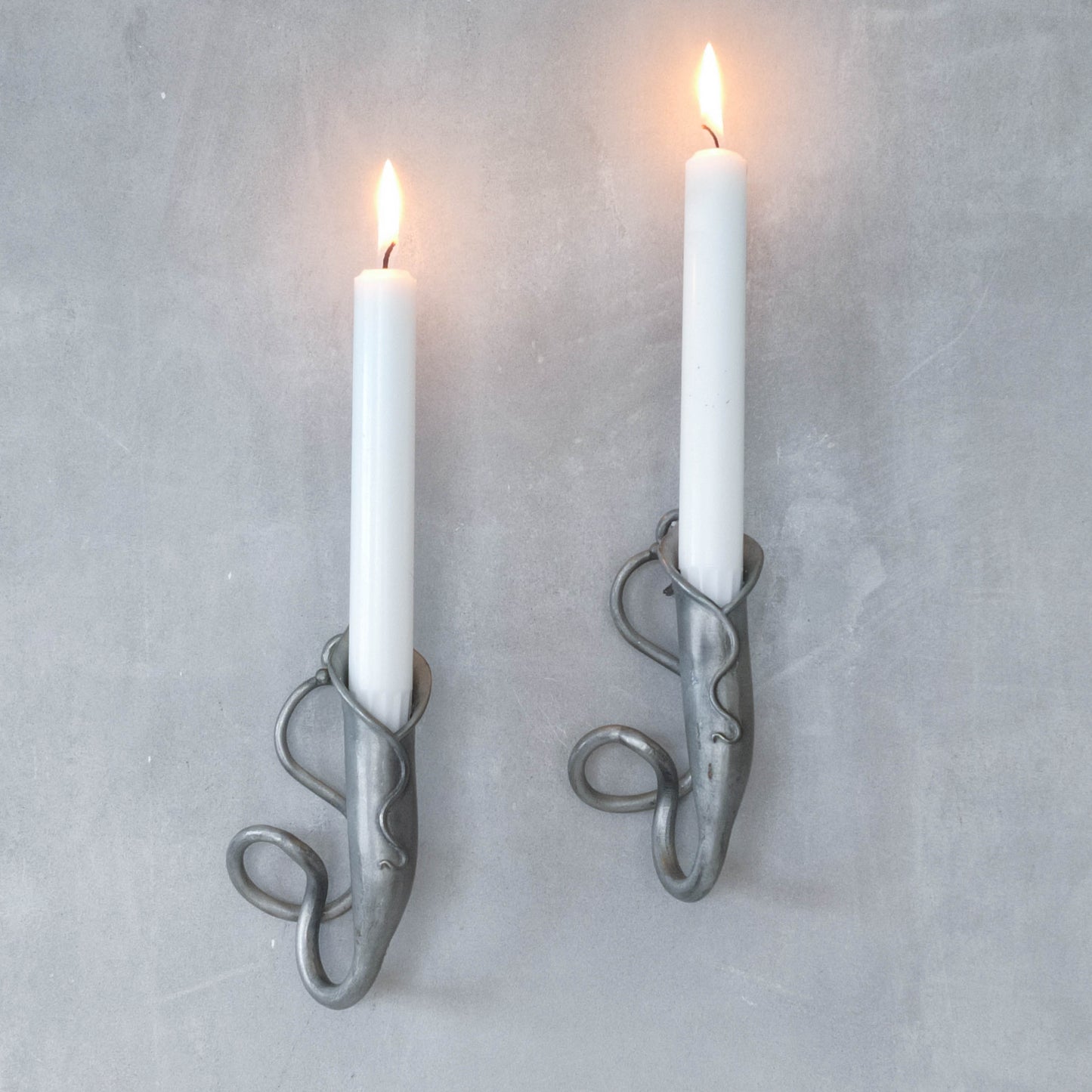 Pair of vintage handmade pewter candle holder wall sconces