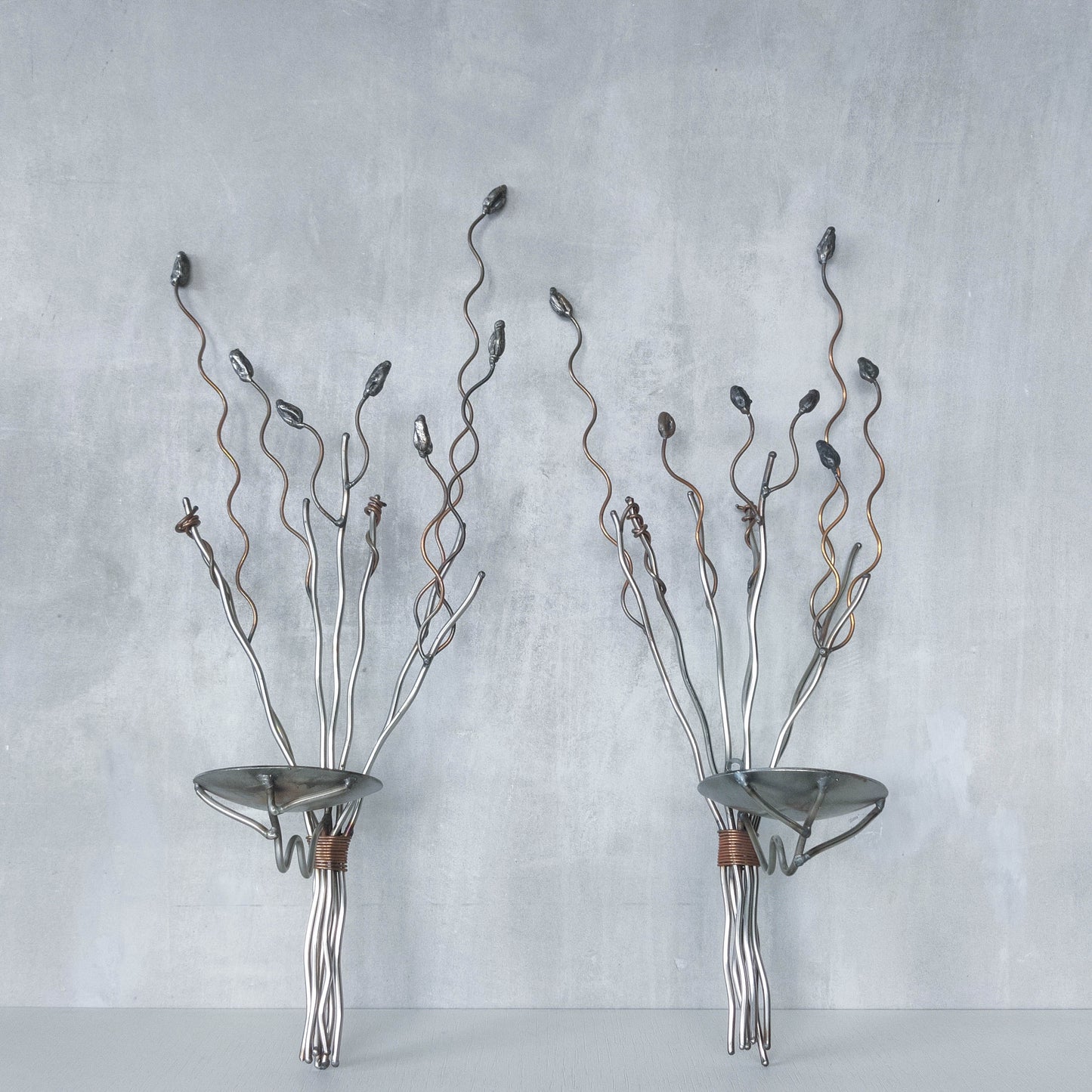 Vintage pair of large artisan made wirework steel and copper candle wall sconces