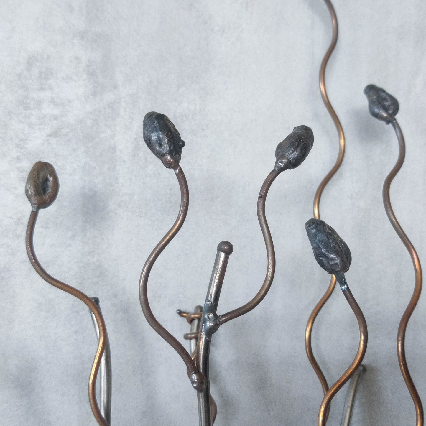 Vintage pair of large artisan made wirework steel and copper candle wall sconces