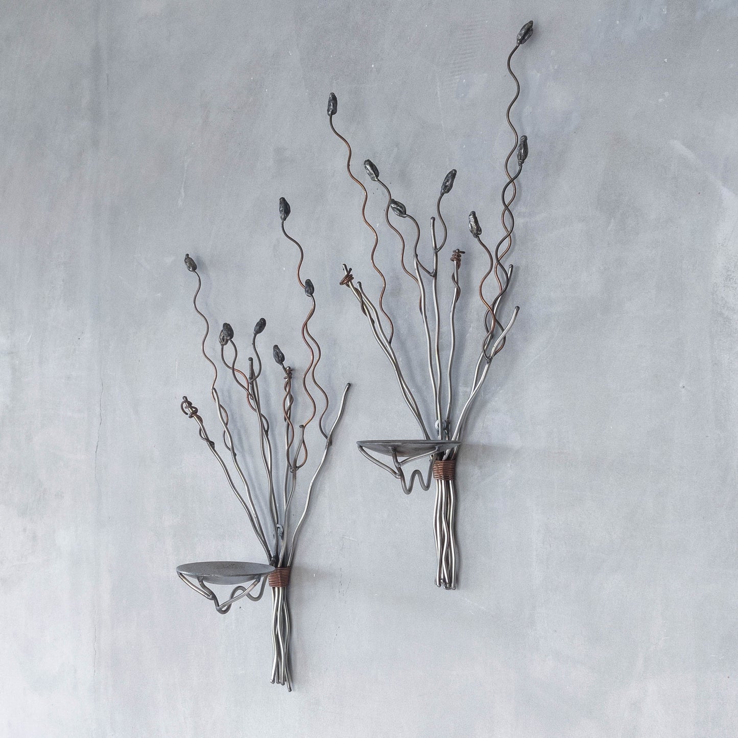 Vintage pair of large artisan made wirework steel and copper candle wall sconces
