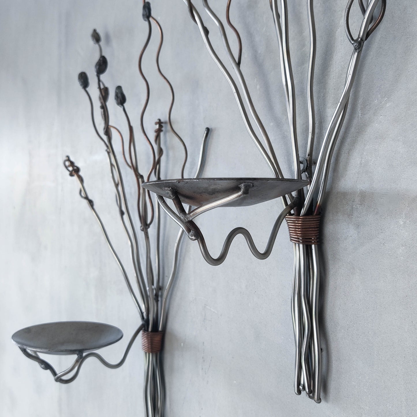 Vintage pair of large artisan made wirework steel and copper candle wall sconces