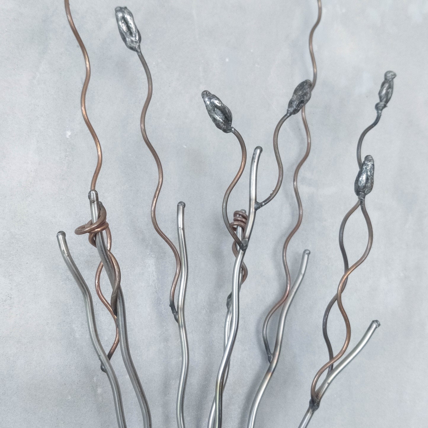 Vintage pair of large artisan made wirework steel and copper candle wall sconces