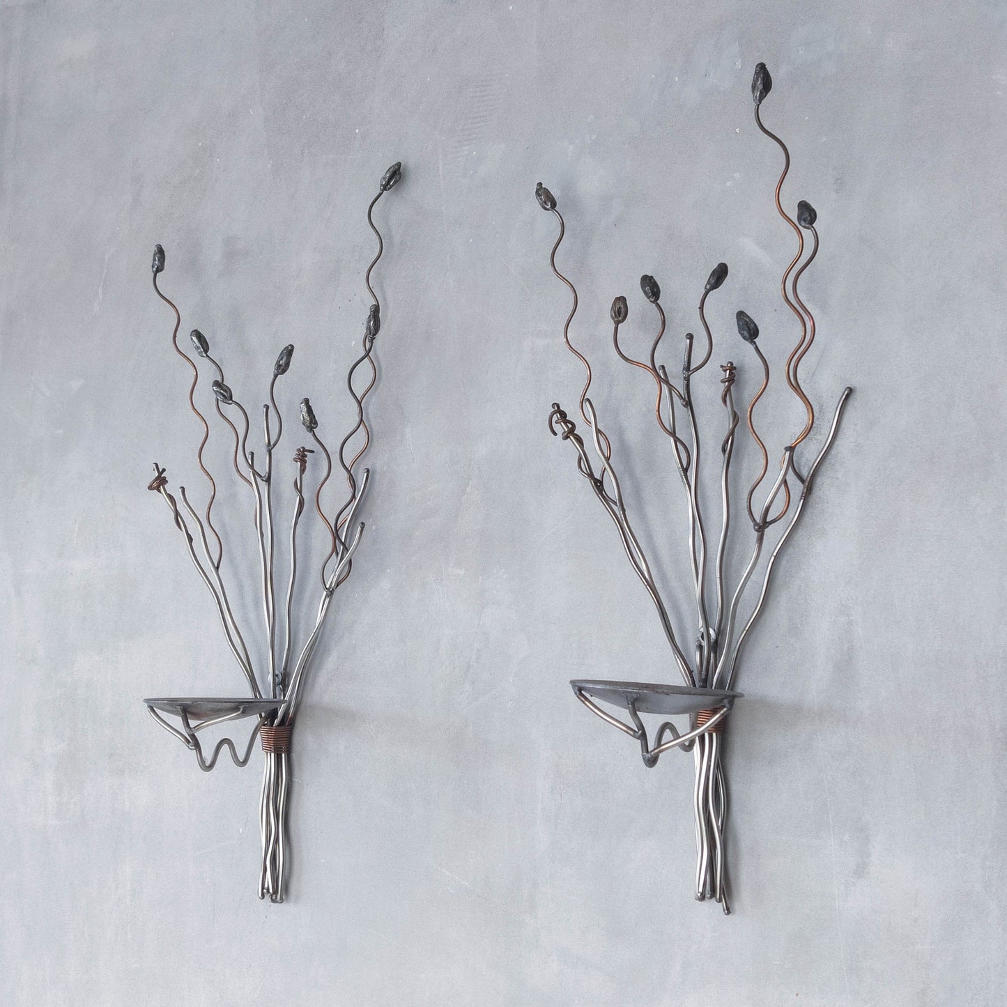 Vintage pair of large artisan made wirework steel and copper candle wall sconces