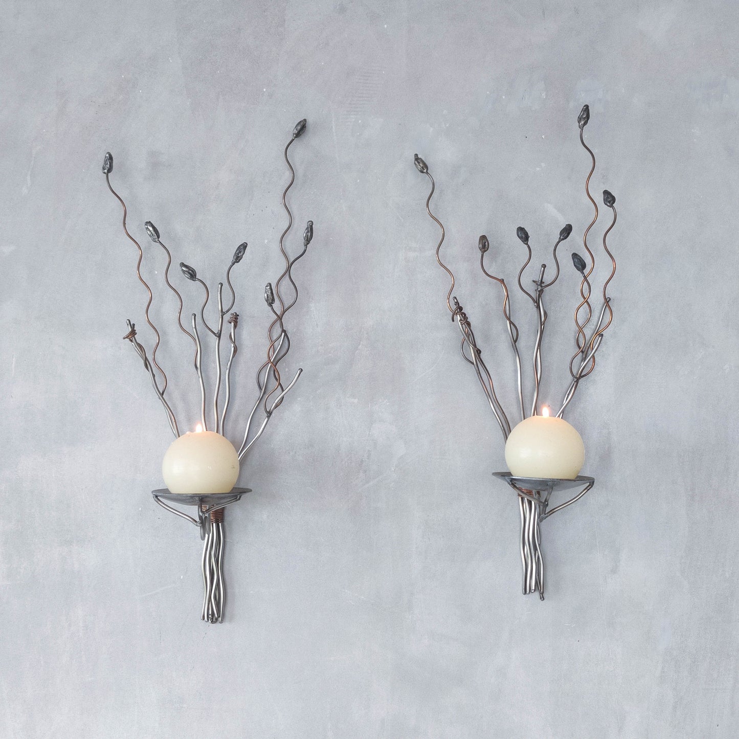 Vintage pair of large artisan made wirework steel and copper candle wall sconces