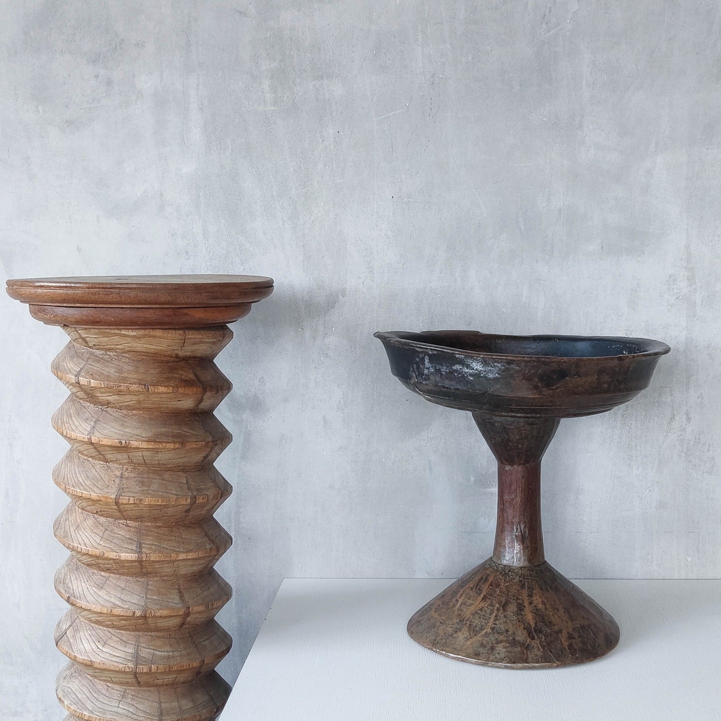 A large sculptural carved and turned vintage wooden pedestal bowl