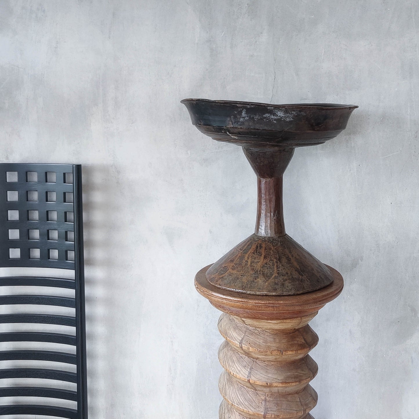 A large sculptural carved and turned vintage wooden pedestal bowl