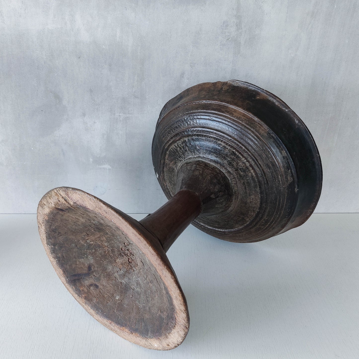 A large sculptural carved and turned vintage wooden pedestal bowl