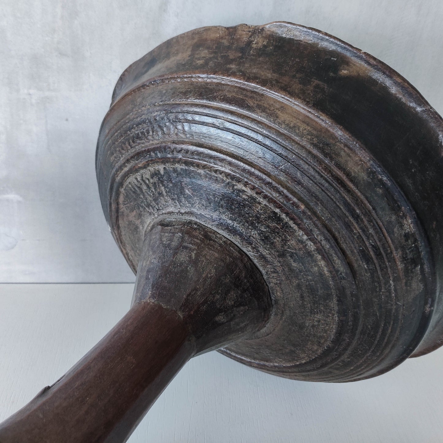 A large sculptural carved and turned vintage wooden pedestal bowl