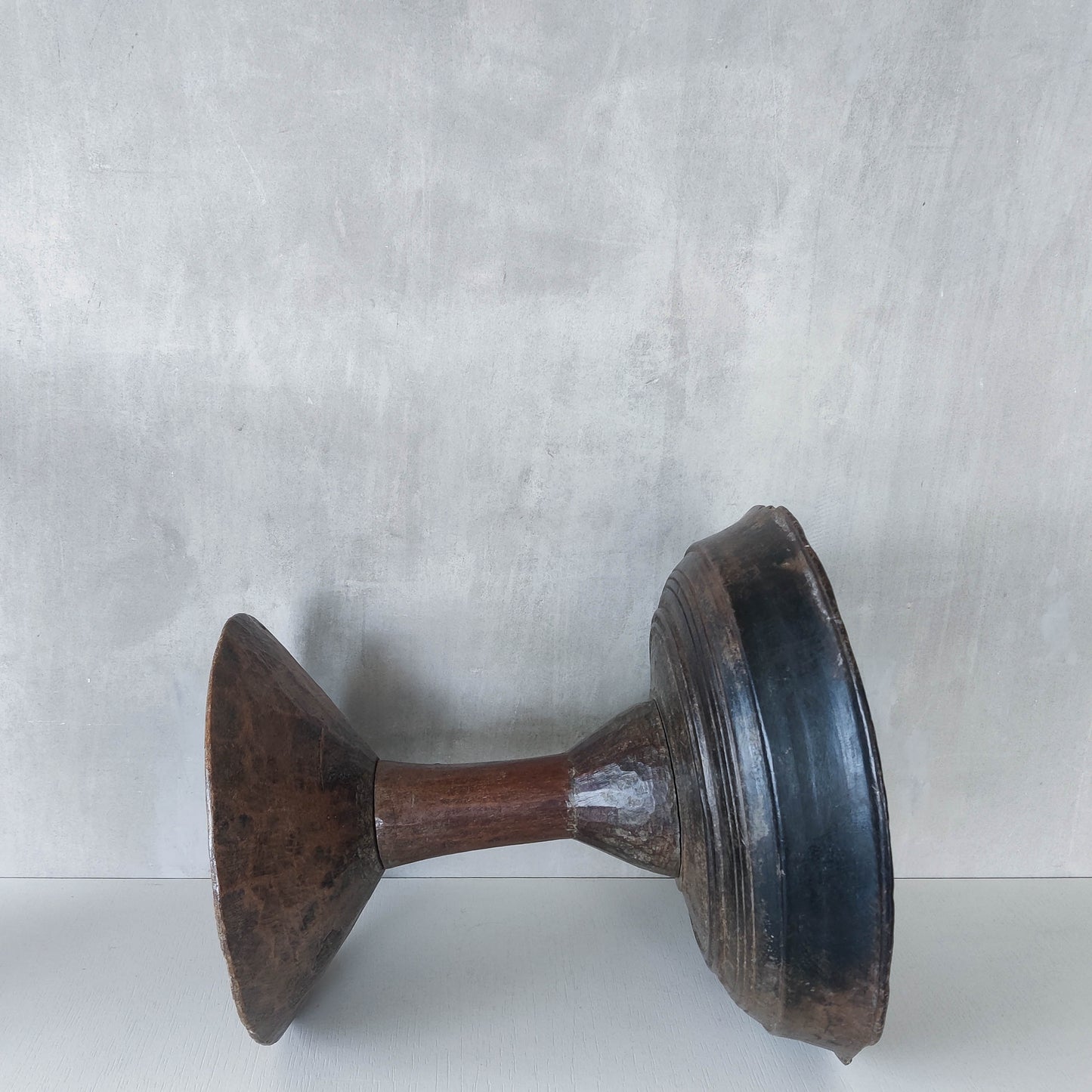 A large sculptural carved and turned vintage wooden pedestal bowl