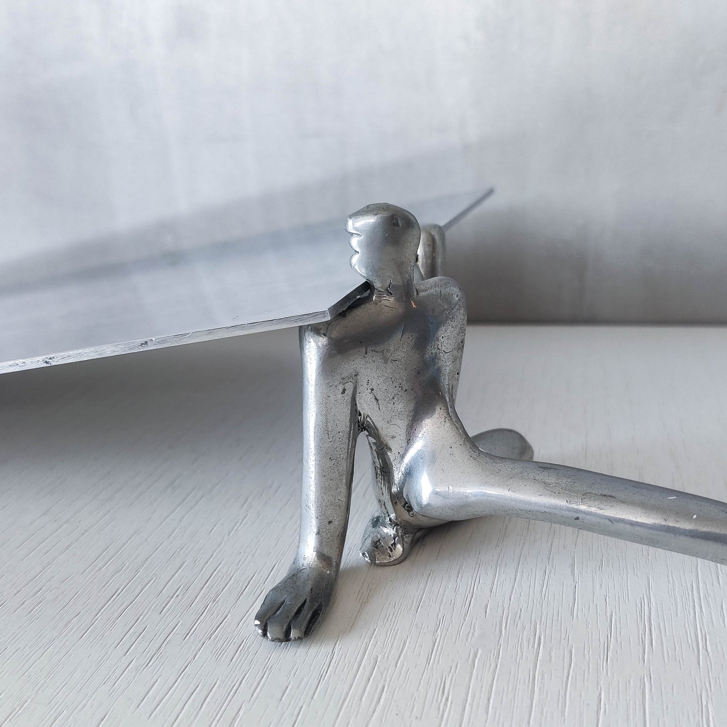 Carrol Boyes vintage 00s cast pewter and folded steel figural book display stand