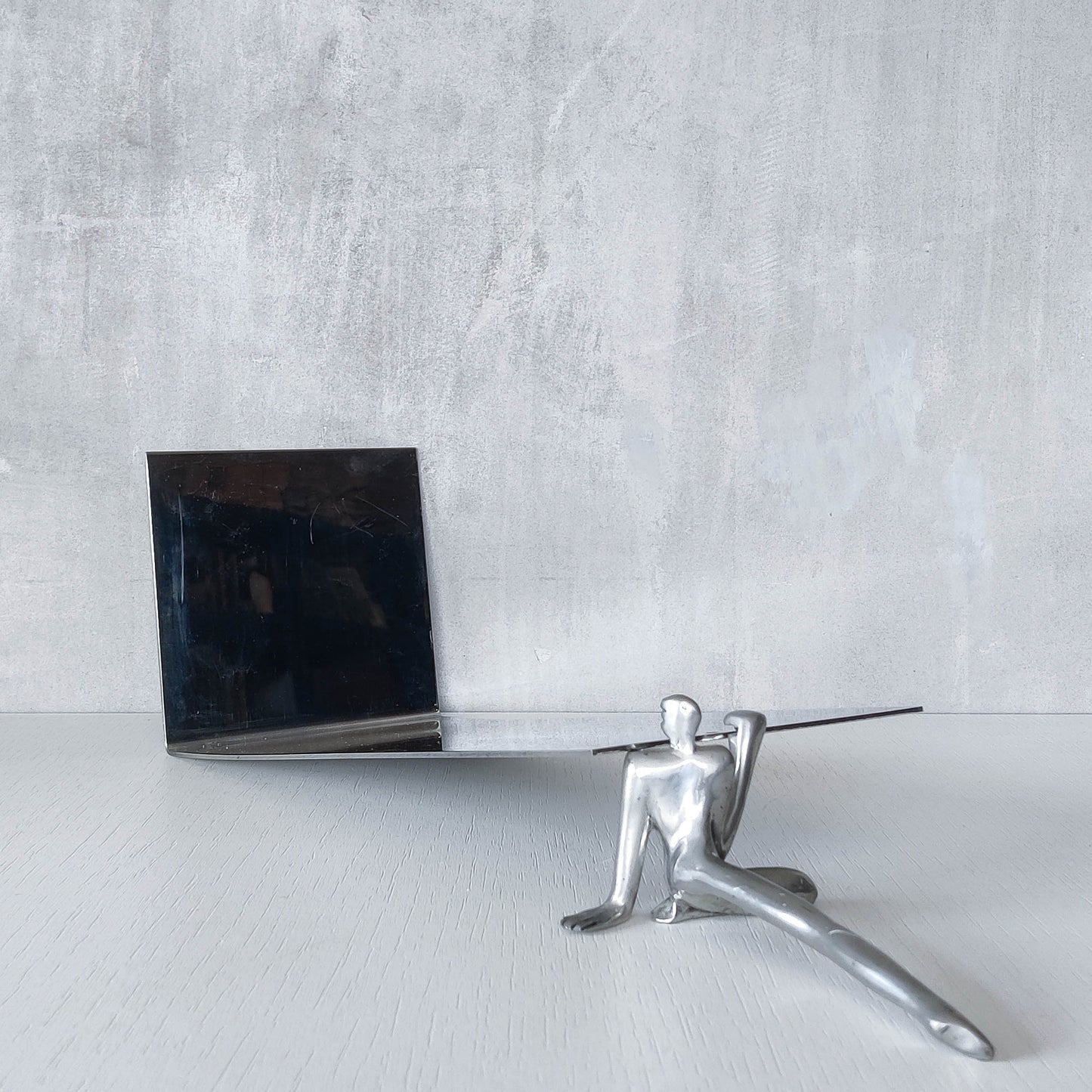 Carrol Boyes vintage 00s cast pewter and folded steel figural book display stand
