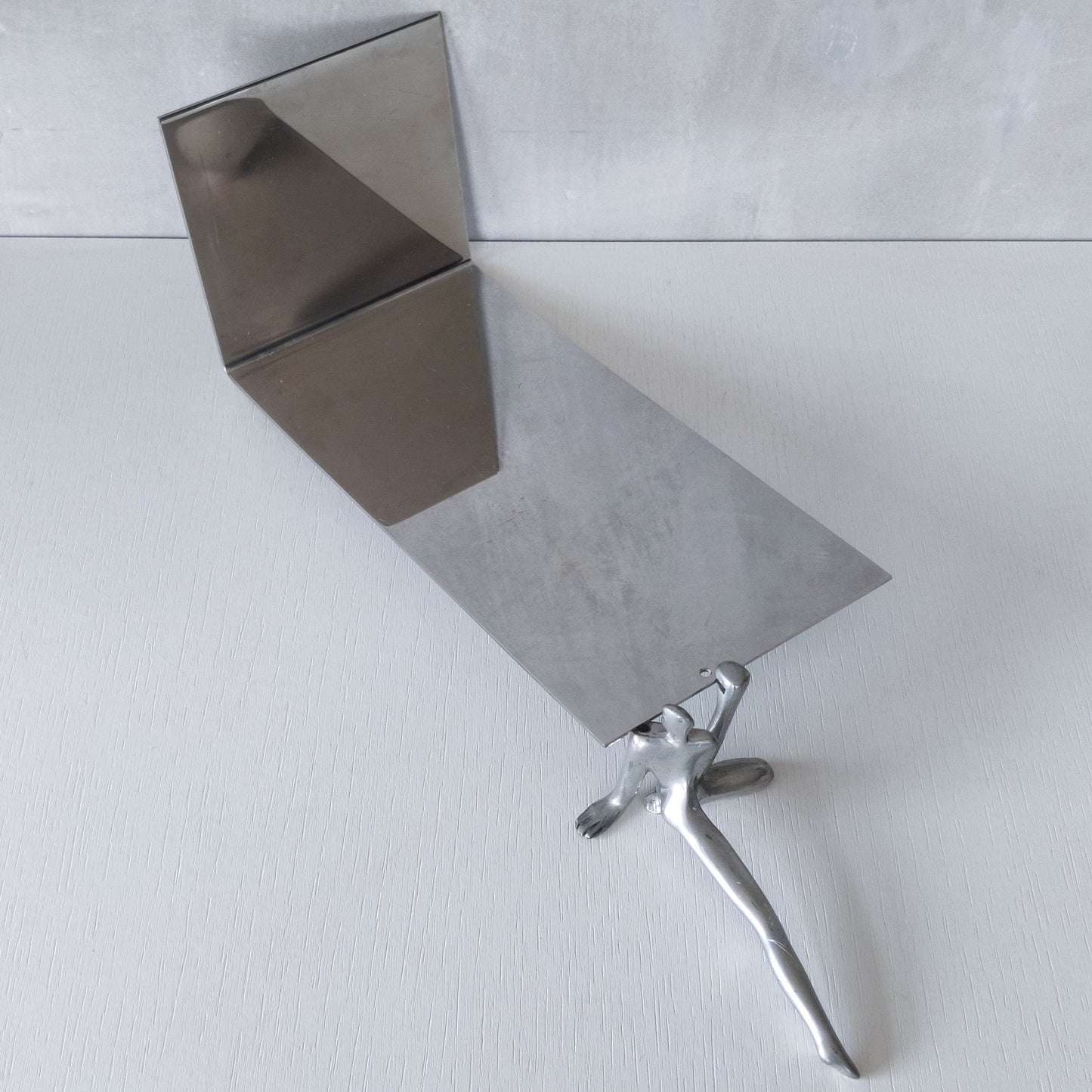 Carrol Boyes vintage 00s cast pewter and folded steel figural book display stand