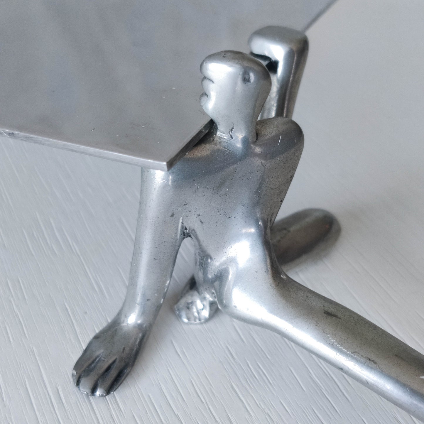 Carrol Boyes vintage 00s cast pewter and folded steel figural book display stand