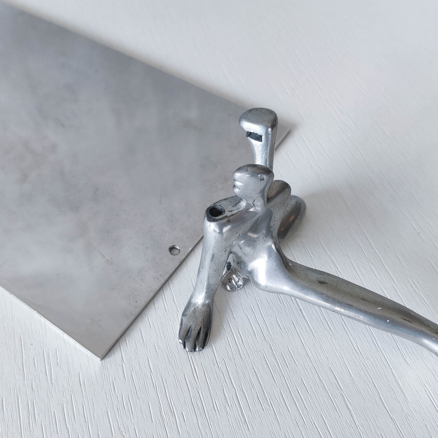 Carrol Boyes vintage 00s cast pewter and folded steel figural book display stand