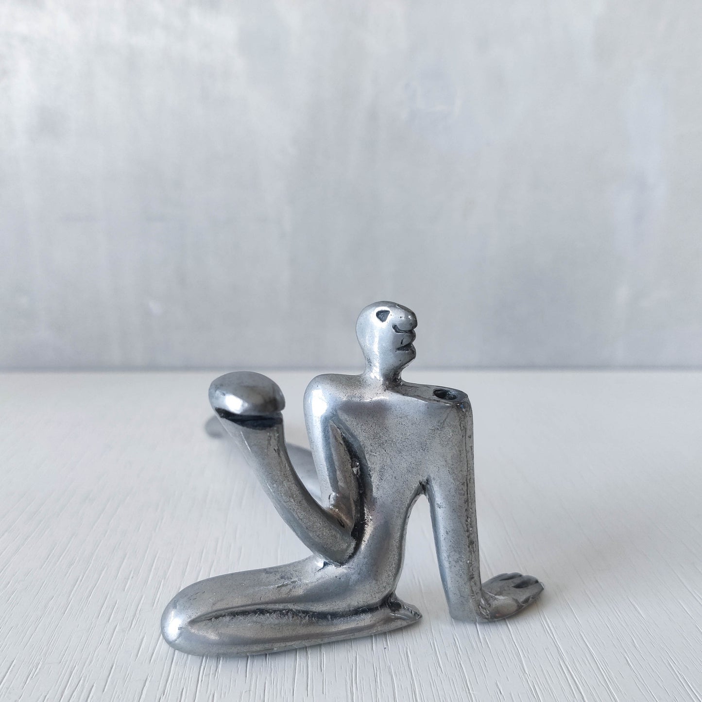 Carrol Boyes vintage 00s cast pewter and folded steel figural book display stand