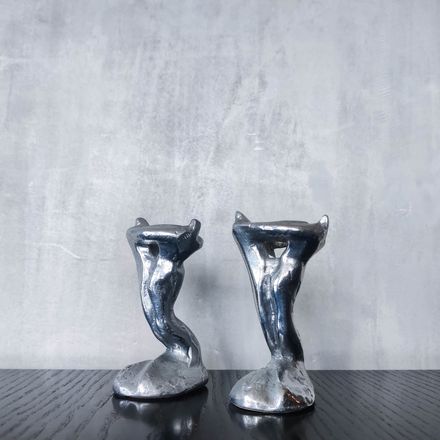Pair of vintage 1980s ART3 David Marshall style cast aluminum brutalist candle holders