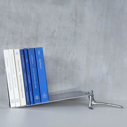 Carrol Boyes vintage 00s cast pewter and folded steel figural book display stand