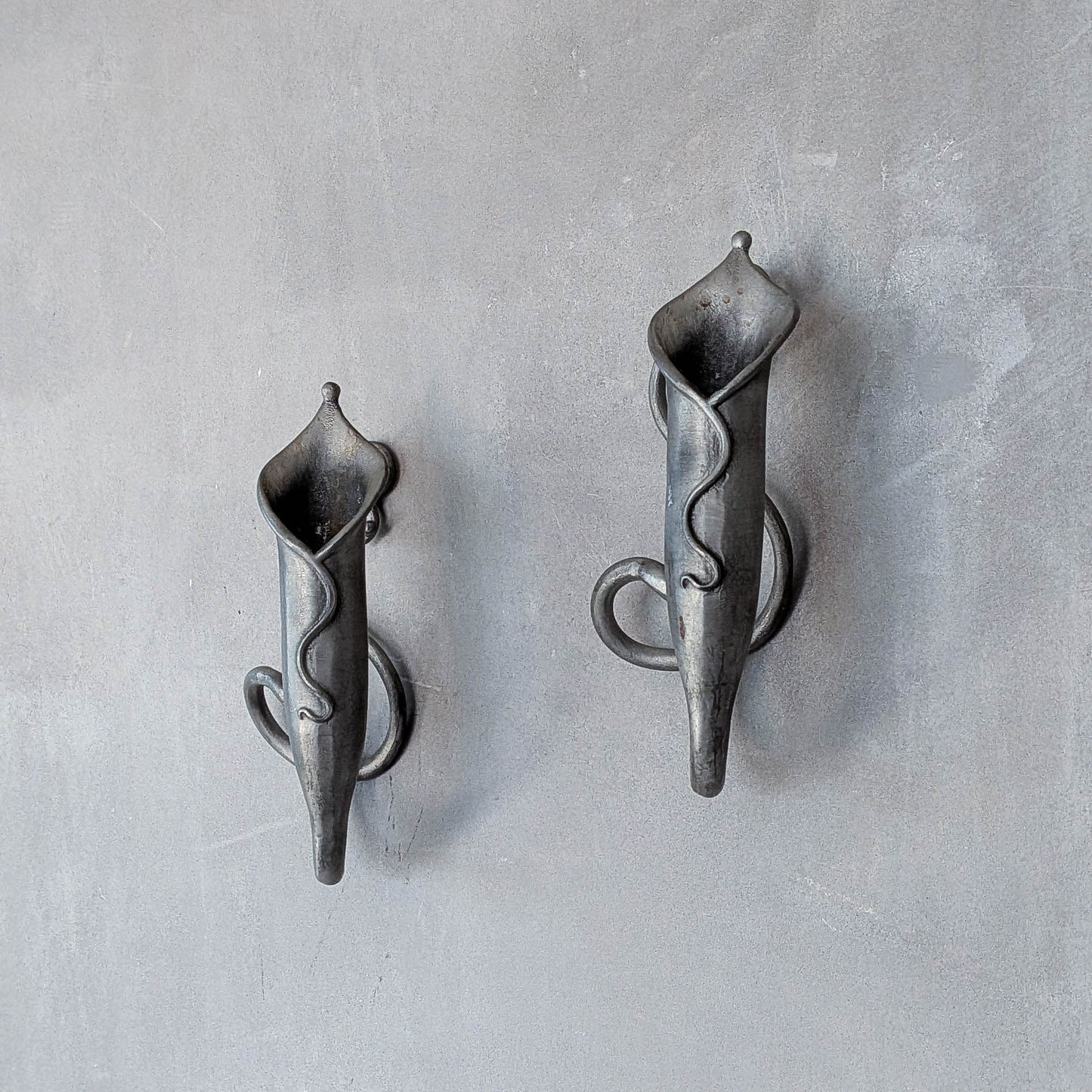 Pair of vintage handmade pewter candle holder wall sconces