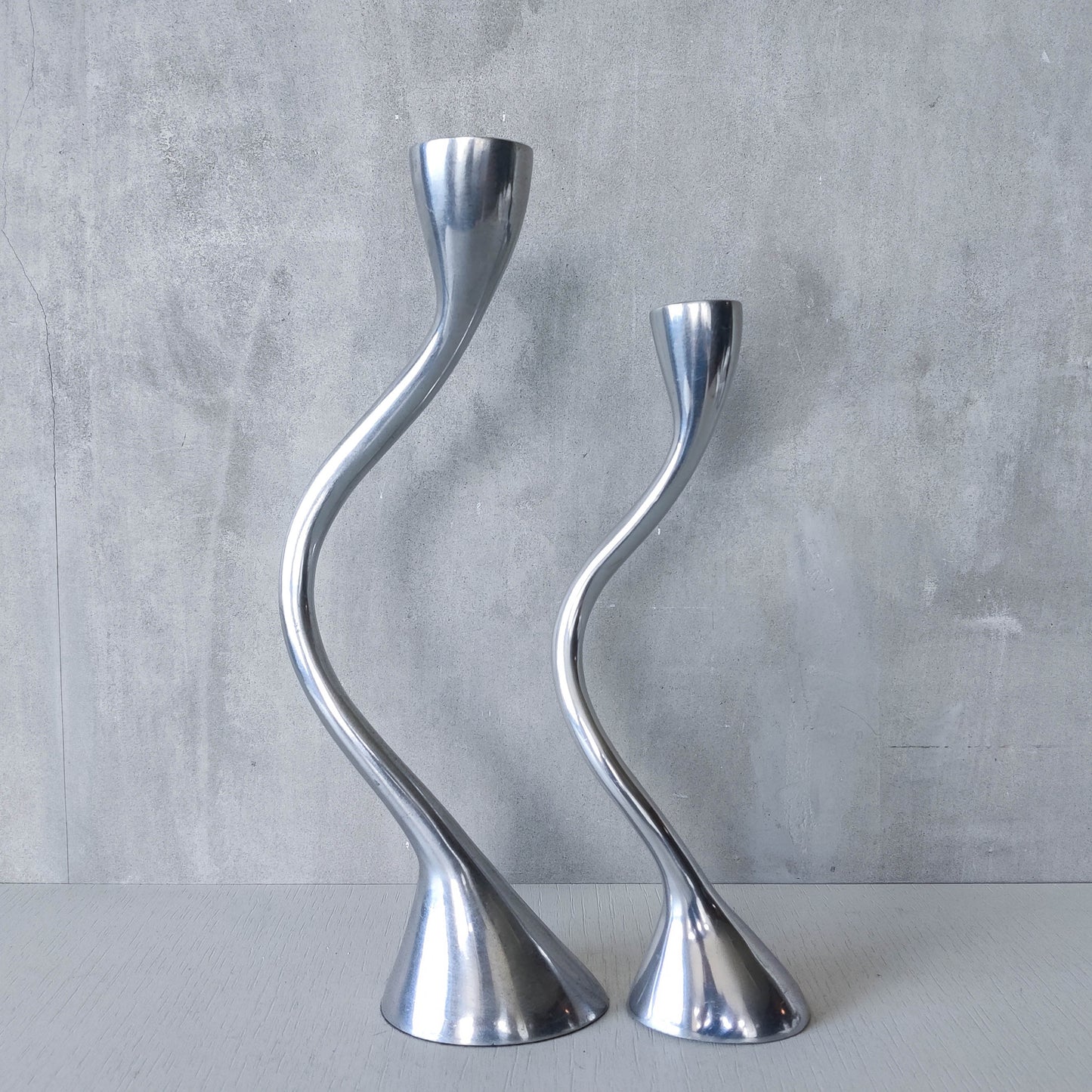 RESERVED Pair of vintage cast aluminium sculptural candle holders wavy