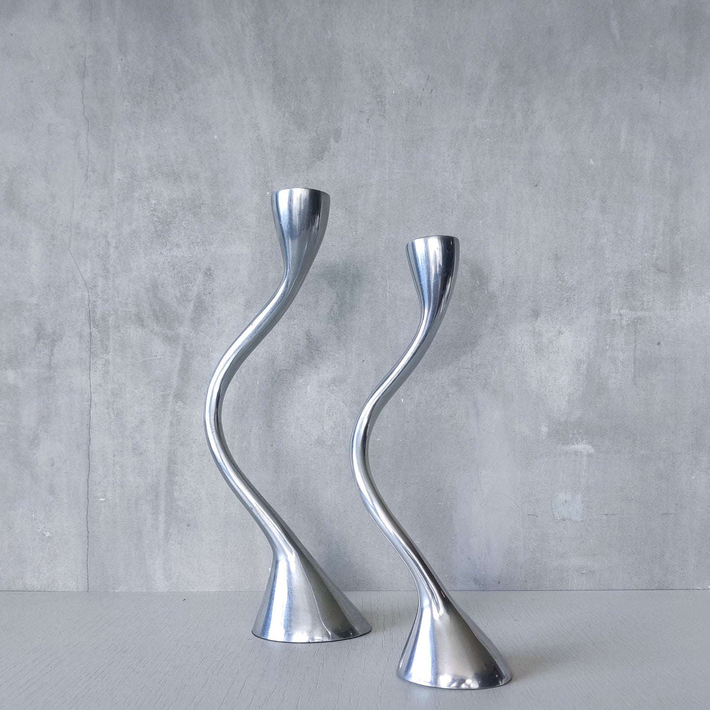 RESERVED Pair of vintage cast aluminium sculptural candle holders wavy