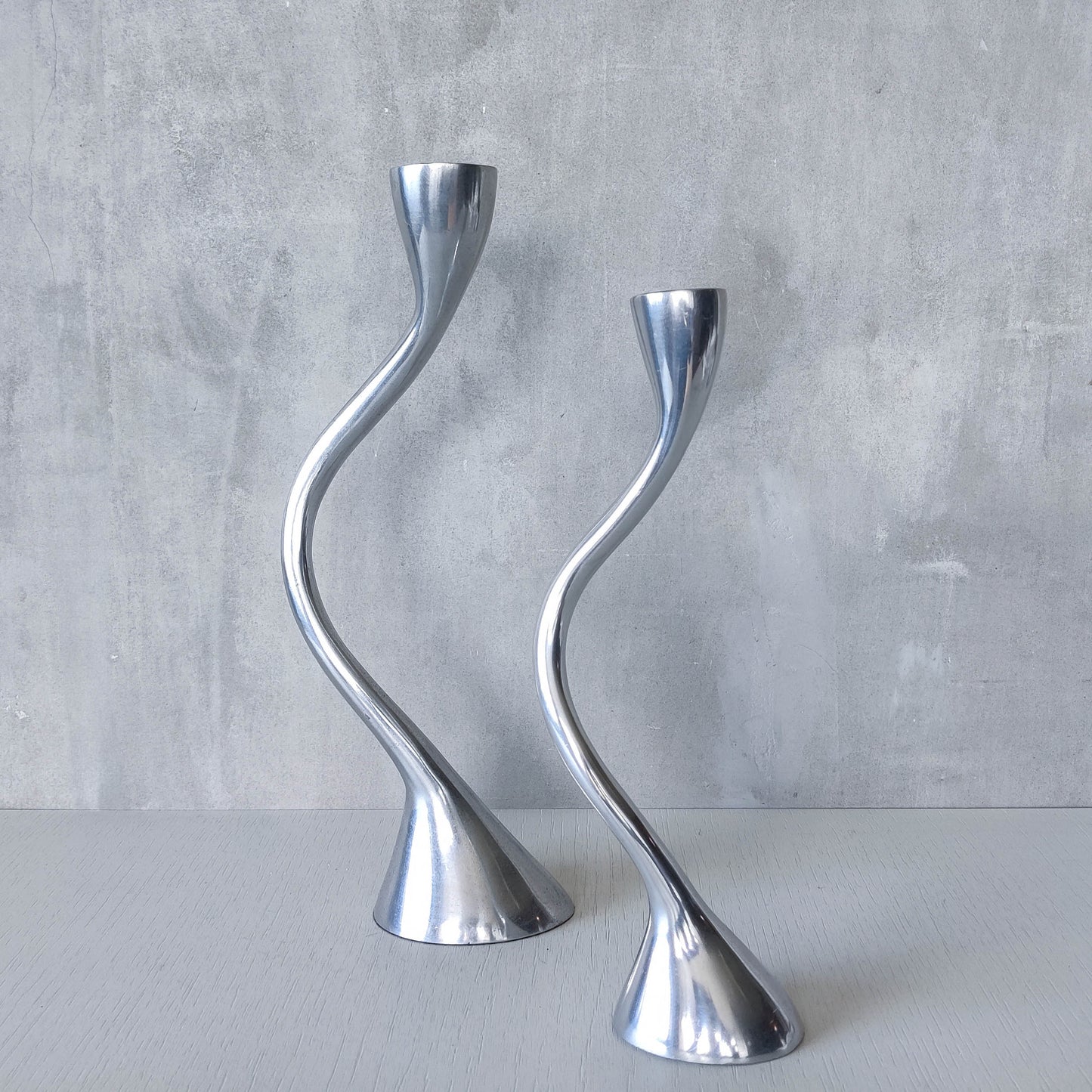 RESERVED Pair of vintage cast aluminium sculptural candle holders wavy