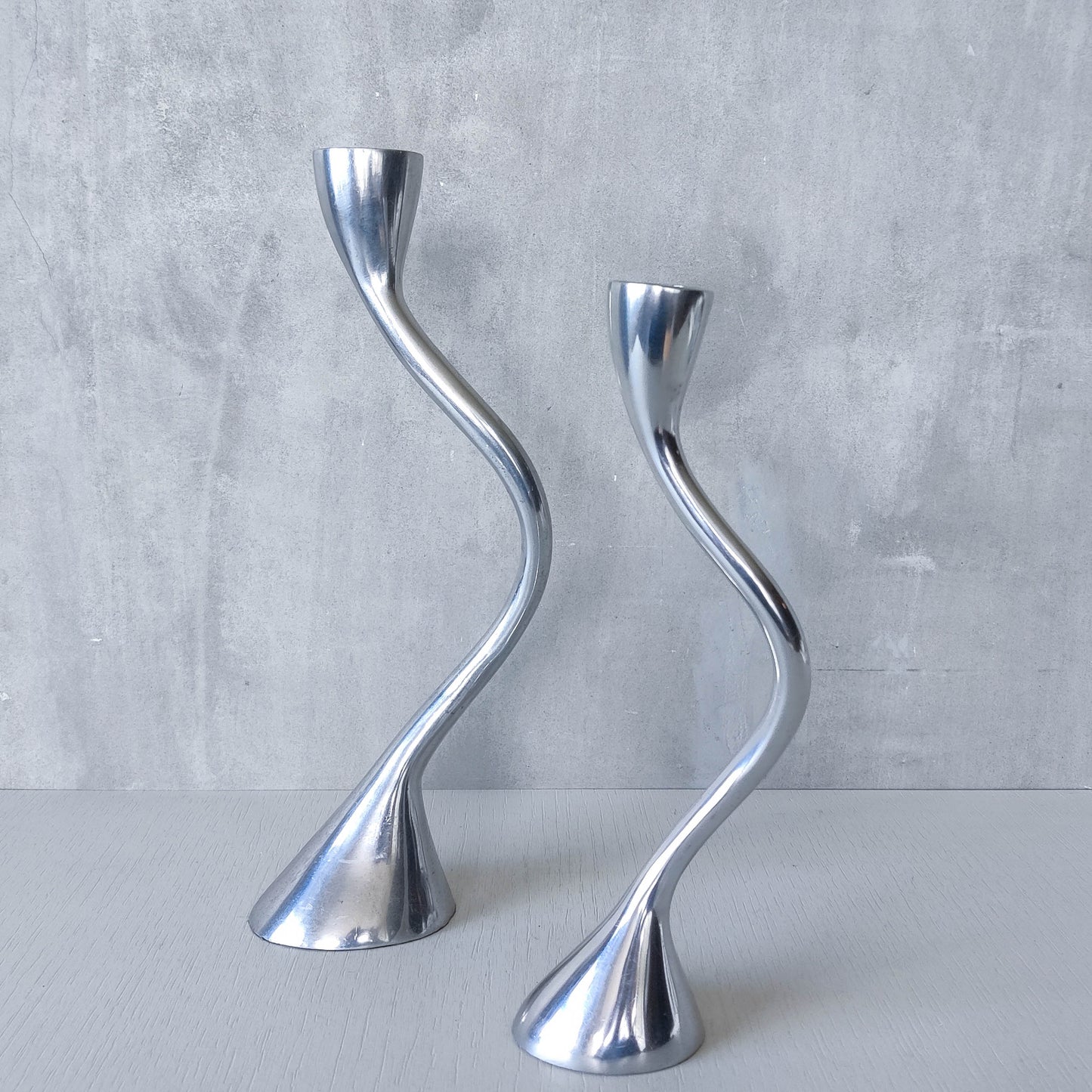 RESERVED Pair of vintage cast aluminium sculptural candle holders wavy