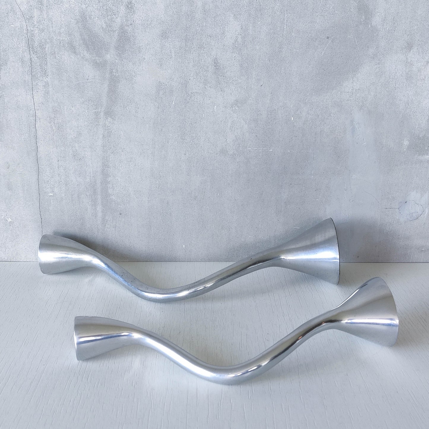 RESERVED Pair of vintage cast aluminium sculptural candle holders wavy