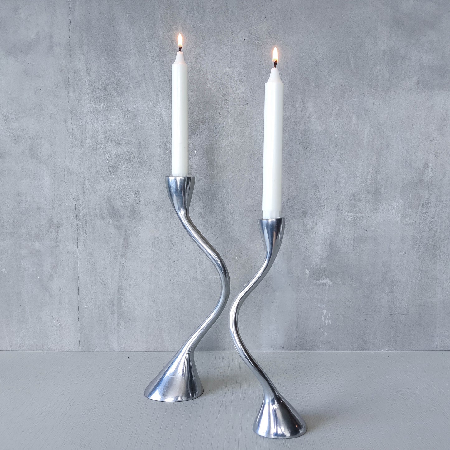 RESERVED Pair of vintage cast aluminium sculptural candle holders wavy