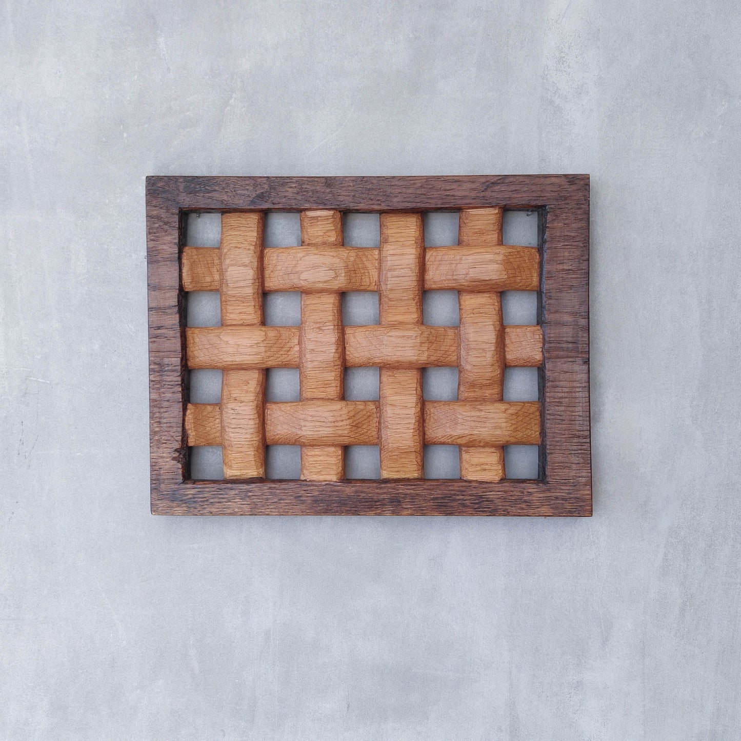 A carved sculptural oak lattice panel wall relief Mouseman studio apprentice piece