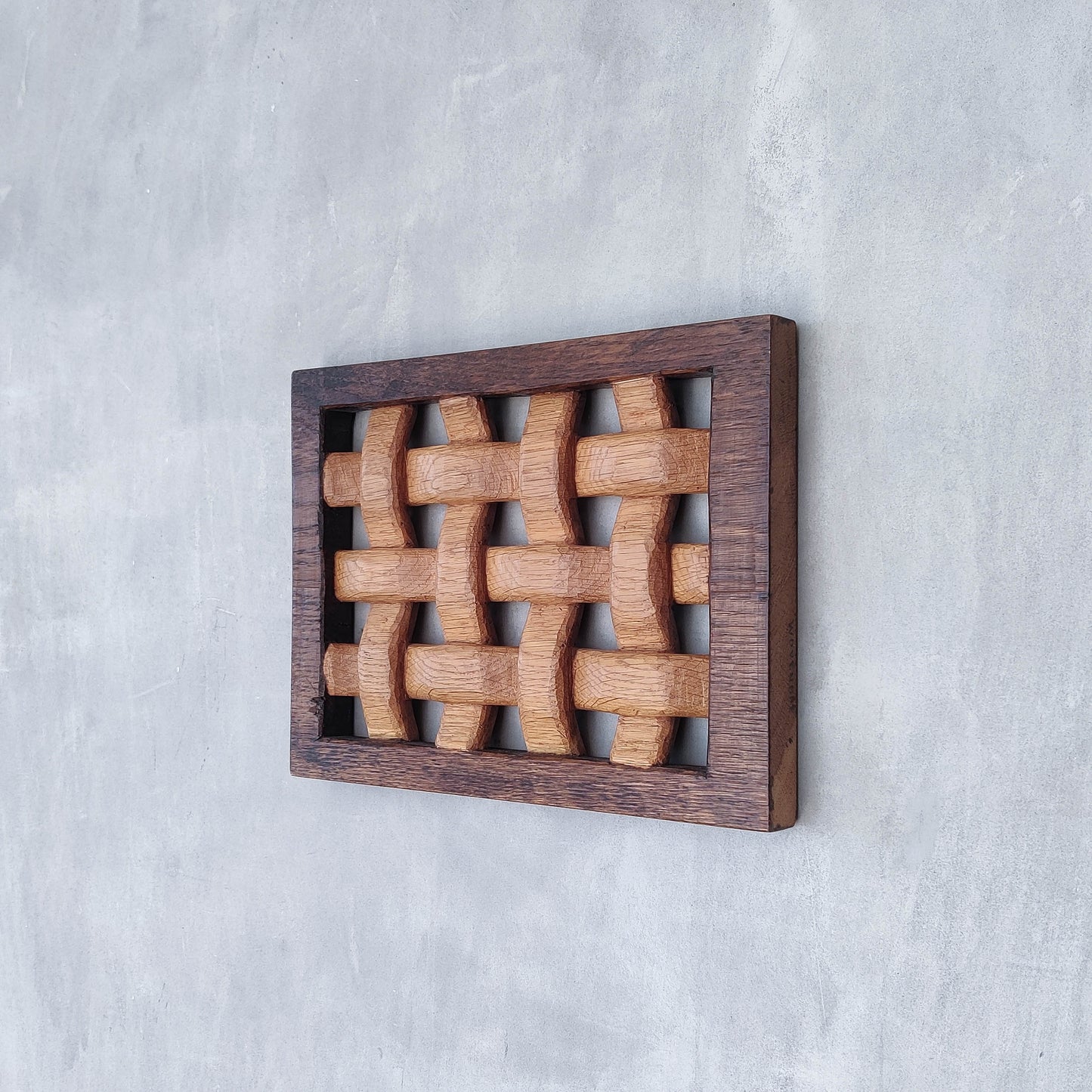 A carved sculptural oak lattice panel wall relief Mouseman studio apprentice piece