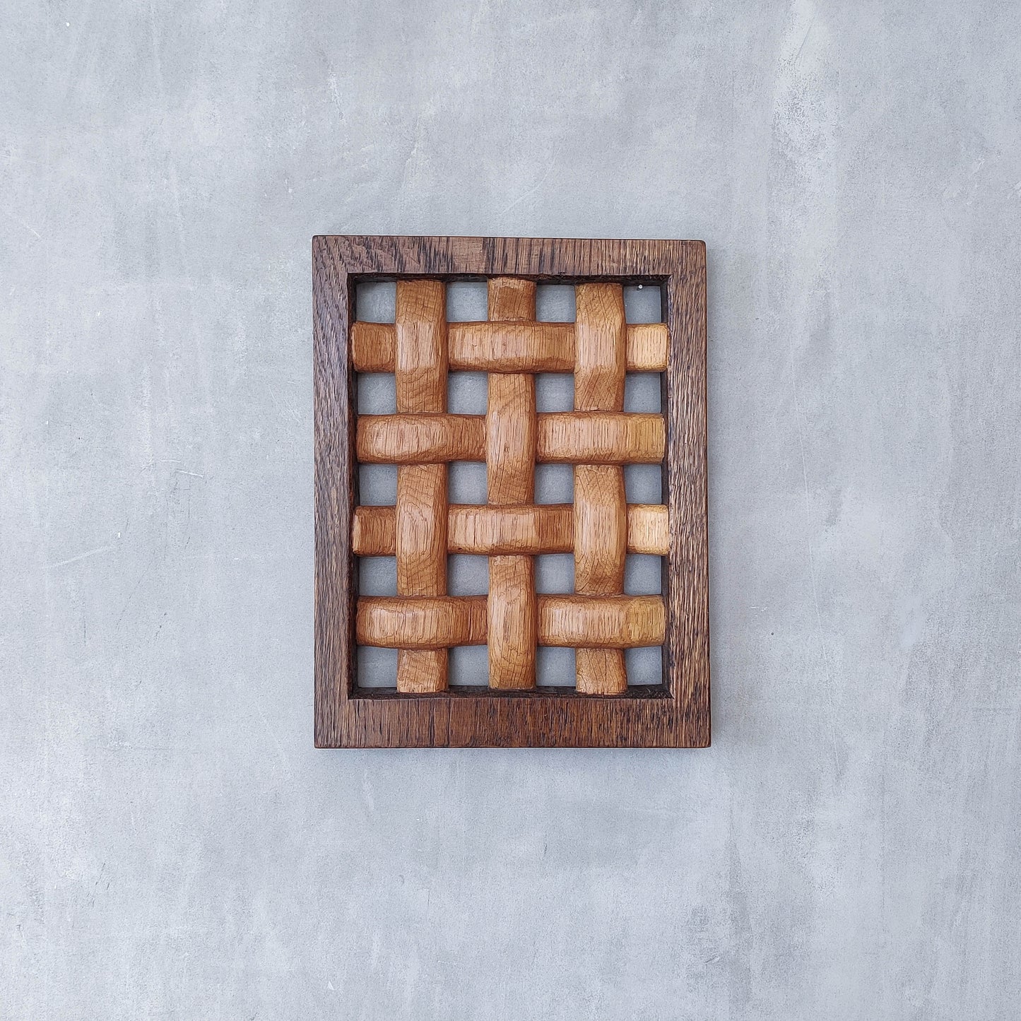 A carved sculptural oak lattice panel wall relief Mouseman studio apprentice piece