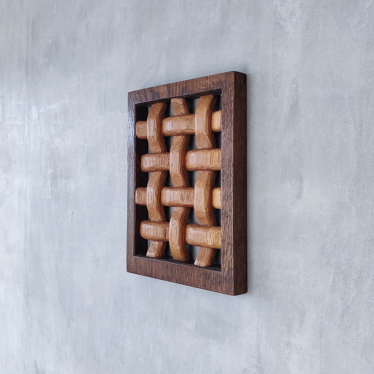 A carved sculptural oak lattice panel wall relief Mouseman studio apprentice piece