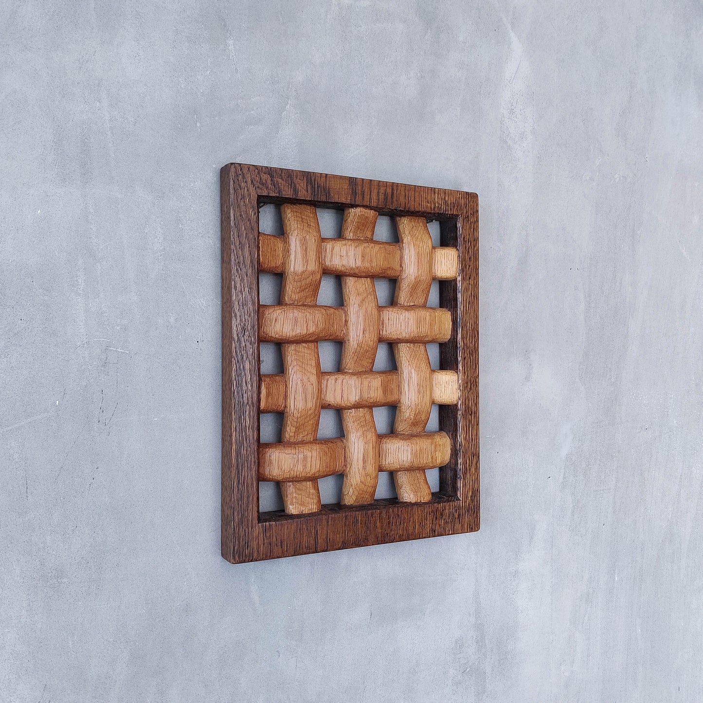 A carved sculptural oak lattice panel wall relief Mouseman studio apprentice piece